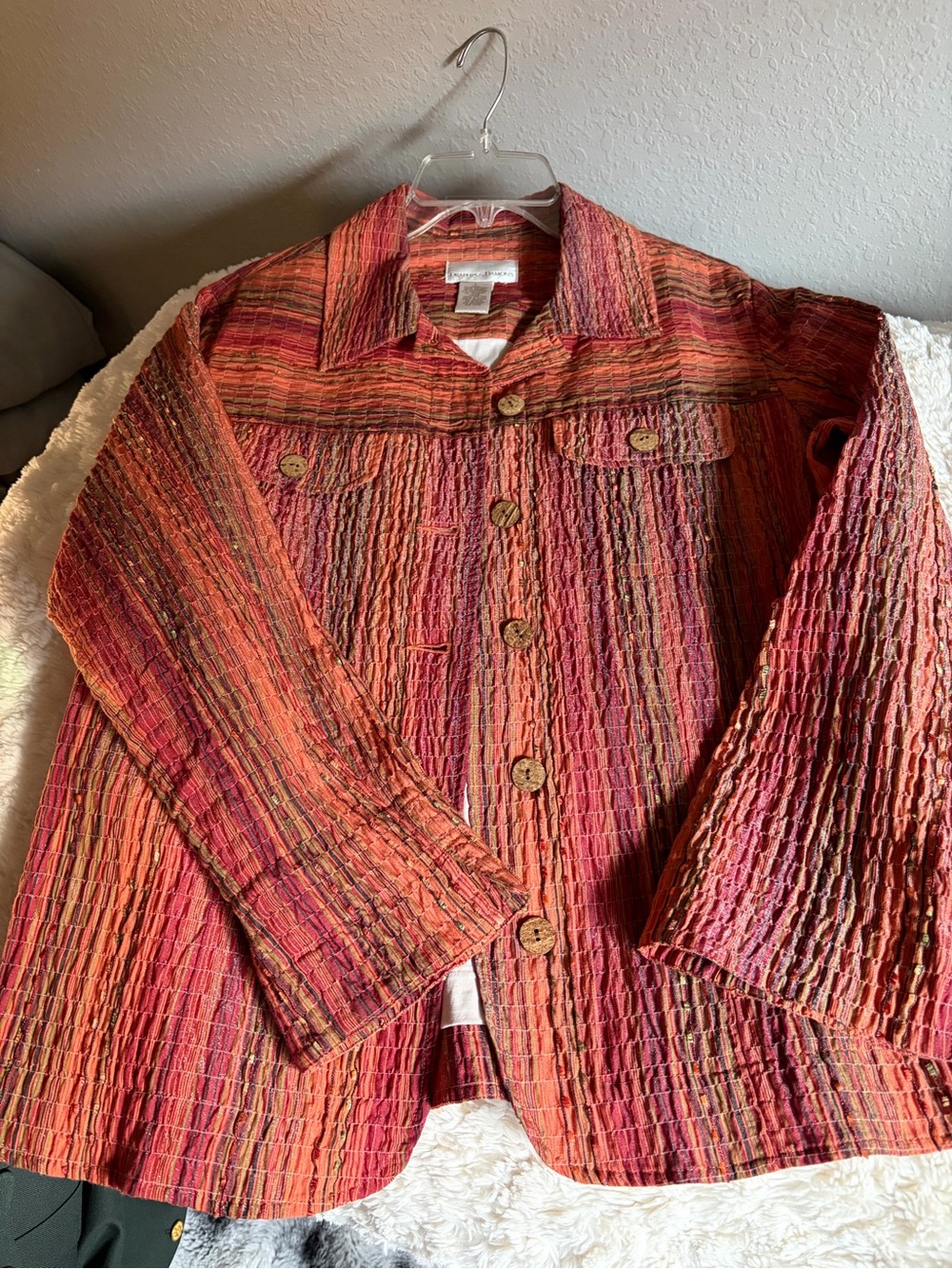 Draper and Damon’s button up multicolor stripes top